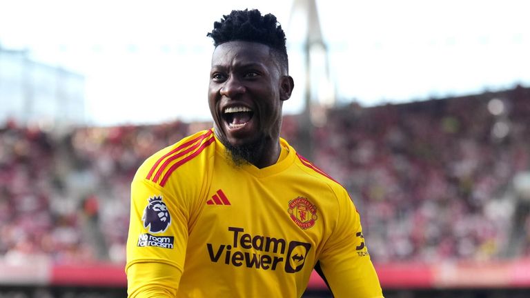 Andre Onana celebrates Manchester United's opening goal at Arsenal