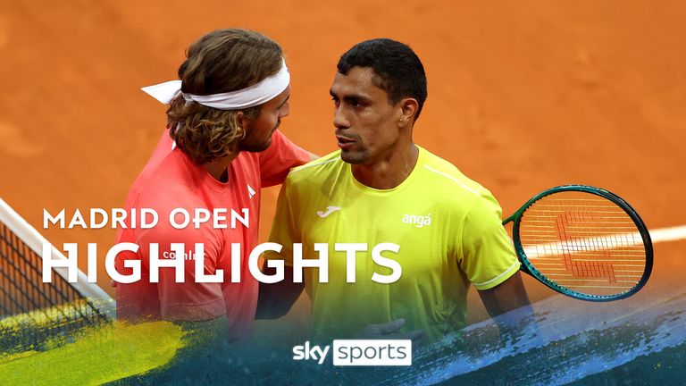 MADRID, SPAIN - APRIL 27: Thiago Monteiro of Brazil embraces Stefanos Tsitsipas of Greece after victory in the Men's Singles Round of 64 match during Day Five of the Mutua Madrid Open at La Caja Magica on April 27, 2024 in Madrid, Spain. (Photo by Clive Brunskill/Getty Images)