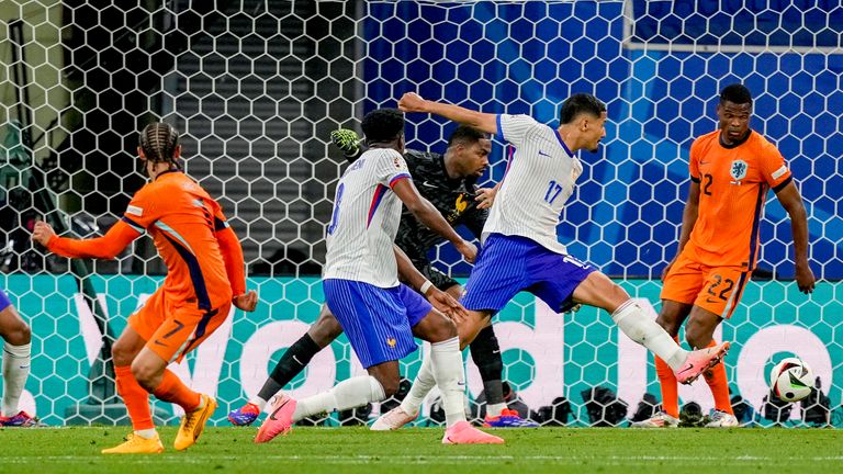 Xavi Simons of the Netherlands, left, scores a goal that was disallowed due to offside
